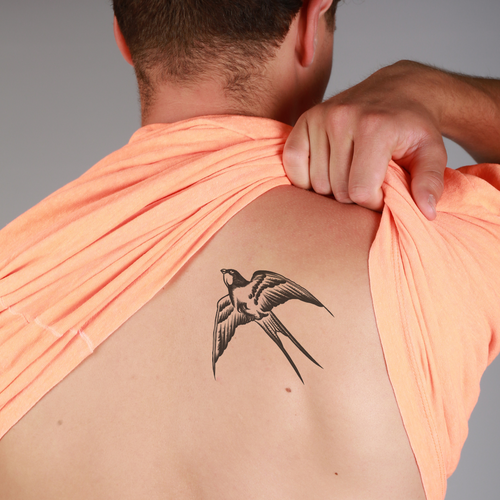 Swallow tattoo