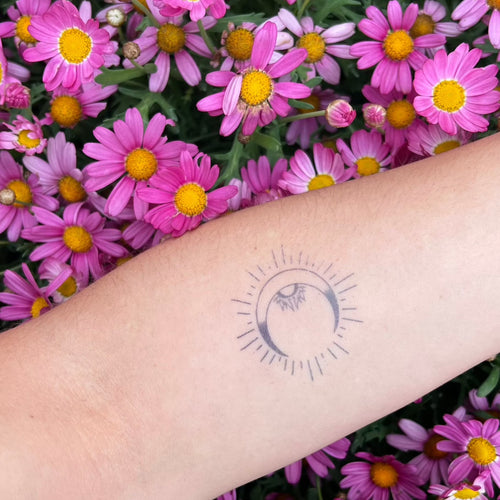 Sun moon tattoo