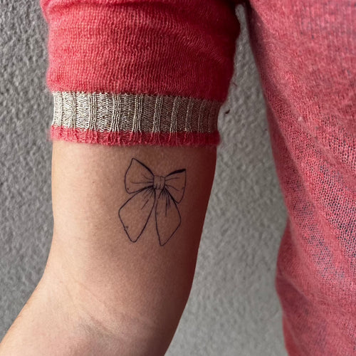 Ribbon tattoo