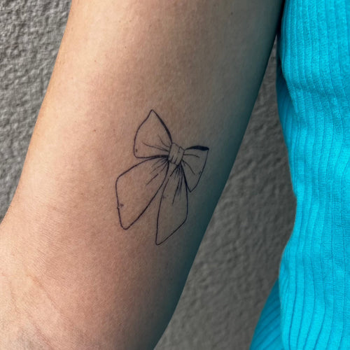 Ribbon tattoo